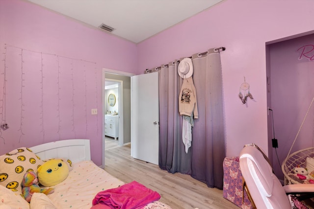 bedroom featuring light hardwood / wood-style flooring