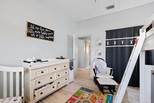 bedroom featuring light wood-type flooring