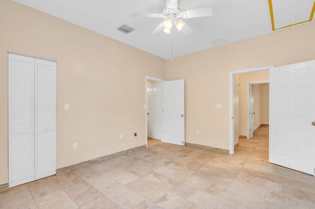 unfurnished bedroom featuring a closet and ceiling fan