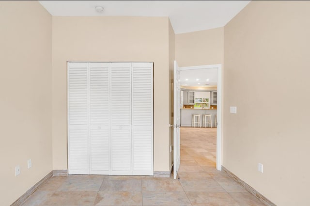 unfurnished bedroom with a closet