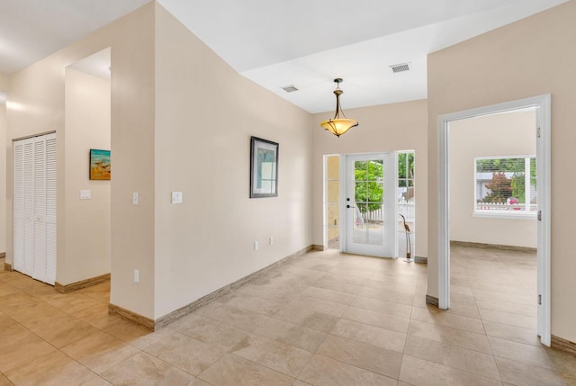 entrance foyer featuring light tile patterned floors