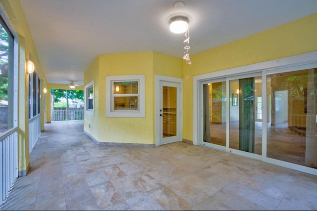 view of patio with ceiling fan