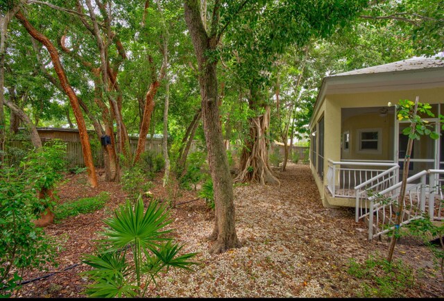 view of yard featuring ceiling fan