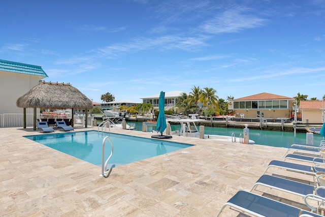 389 N Anglers Dr Unit 101, Marathon, FL 33050 - community pool with a gazebo, a boat dock, a patio area, and a water view