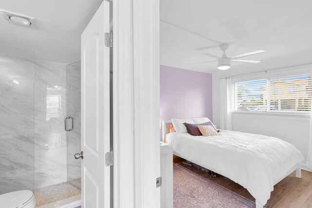 389 N Anglers Dr Unit 101, Marathon, FL 33050 - bedroom with wood finished floors and ceiling fan