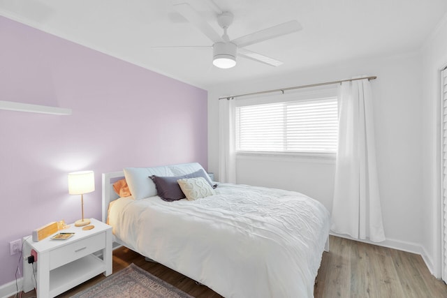 389 N Anglers Dr Unit 101, Marathon, FL 33050 - bedroom with wood finished floors and a ceiling fan