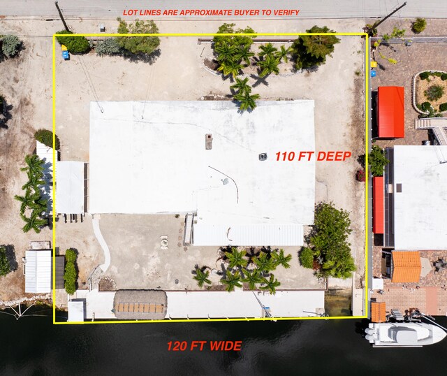 214 Pueblo St, Tavernier, FL 33070 - aerial view of property and surrounding area featuring property boundaries highlighted