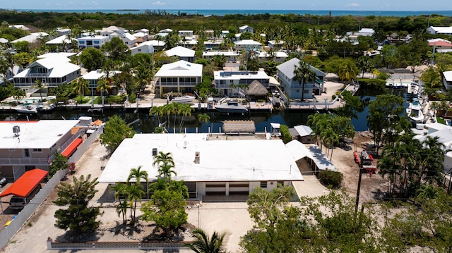 214 Pueblo St, Tavernier, FL 33070 - aerial view of residential area with a large body of water