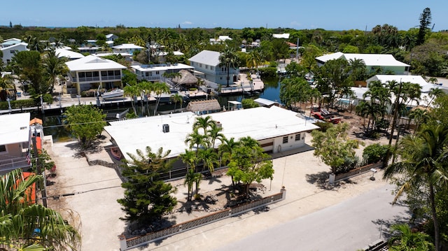 214 Pueblo St, Tavernier, FL 33070 - aerial view of residential area with a large body of water