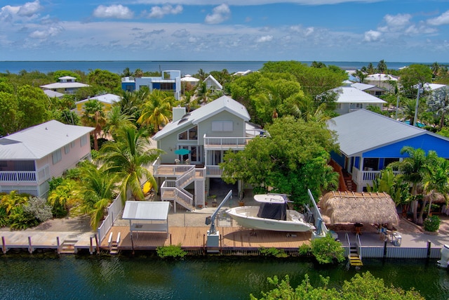 drone / aerial view featuring a water view