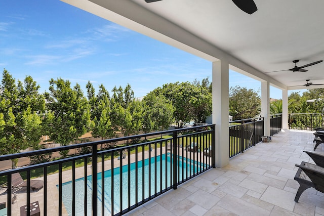 balcony featuring ceiling fan