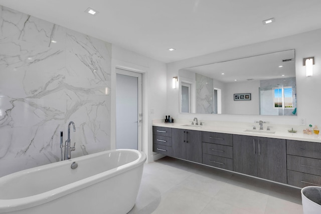 bathroom featuring vanity and a bathtub