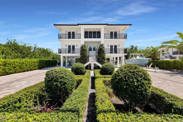 view of front of home with a balcony