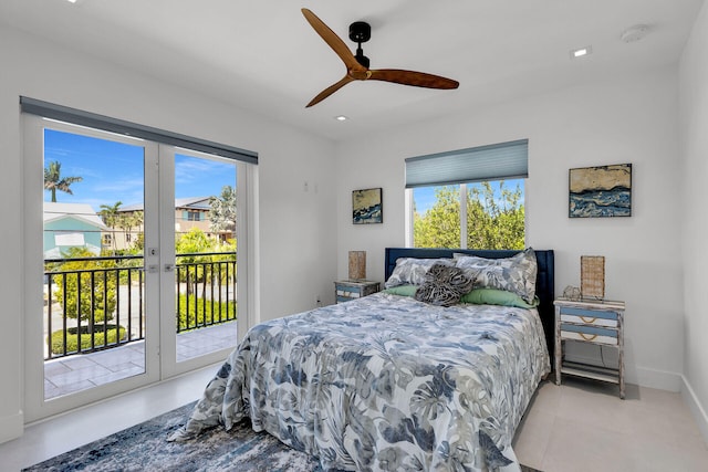 bedroom featuring french doors, ceiling fan, and access to exterior