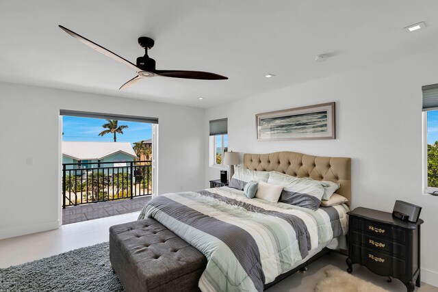 bedroom with access to outside and ceiling fan