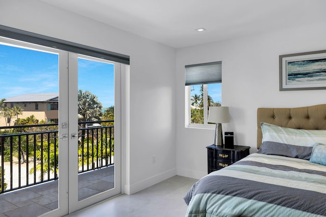 bedroom featuring french doors and access to outside