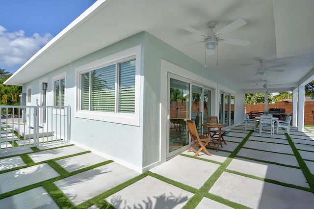 view of patio / terrace featuring ceiling fan