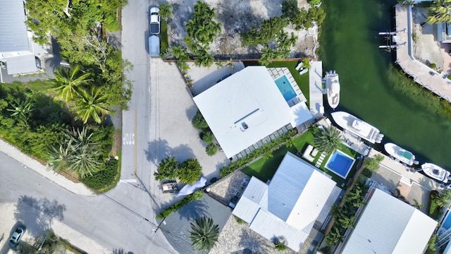 drone / aerial view with a water view