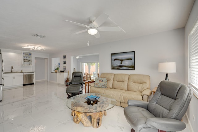 living room featuring sink and ceiling fan