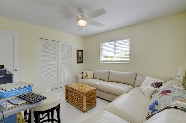 living room with ceiling fan