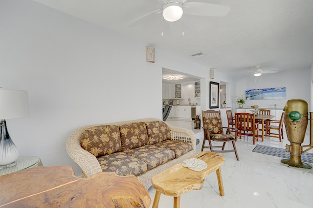 living room featuring ceiling fan