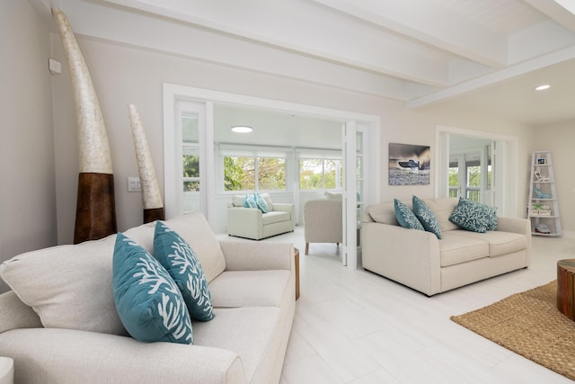 living room with beam ceiling