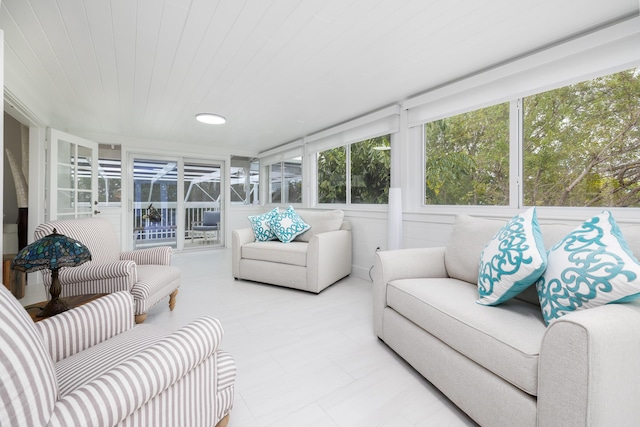 sunroom / solarium featuring wood ceiling