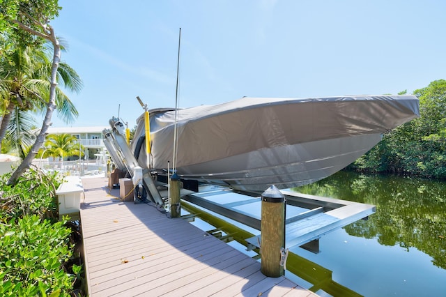 dock area with a water view