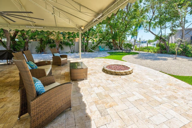 view of patio / terrace with ceiling fan and outdoor lounge area