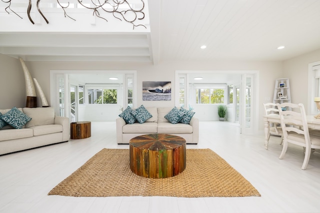 living room featuring beam ceiling