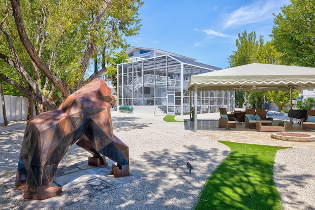 view of property's community featuring an outdoor living space