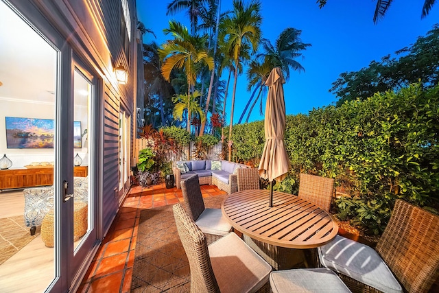 view of patio terrace at dusk