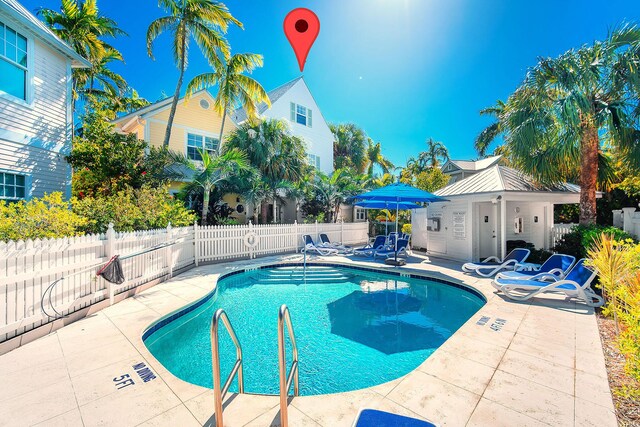 view of swimming pool featuring a patio area