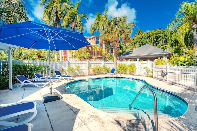 view of swimming pool featuring a gazebo and a patio area