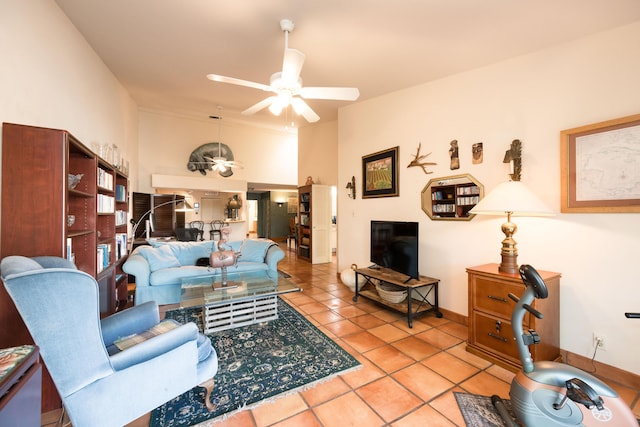 living room featuring light tile patterned floors and ceiling fan