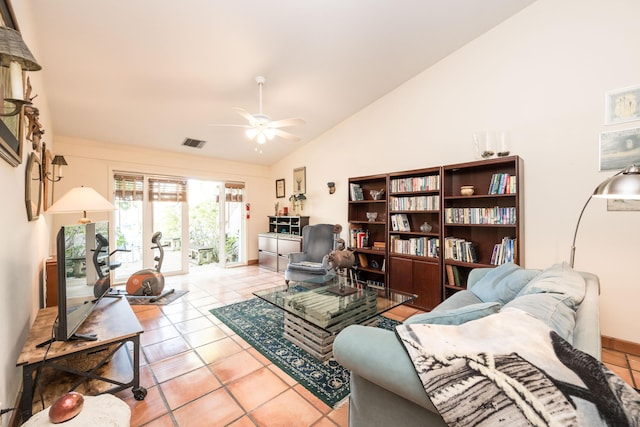 tiled living room featuring high vaulted ceiling and ceiling fan