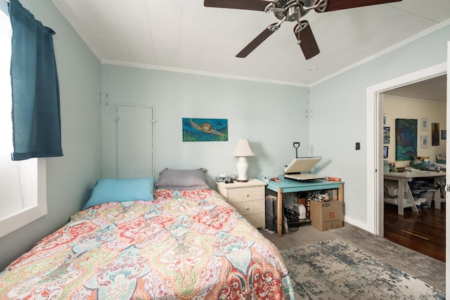 bedroom with baseboards, carpet, a ceiling fan, and crown molding