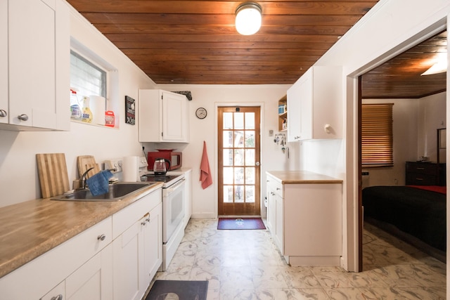 kitchen featuring light countertops, white electric range, wood ceiling, white cabinets, and a sink