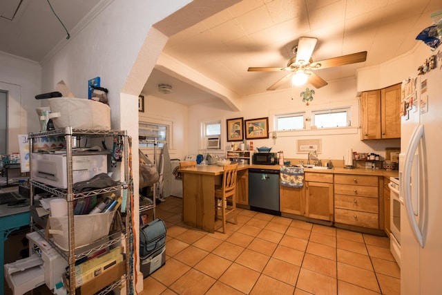 kitchen with light tile patterned floors, light countertops, white appliances, and ornamental molding