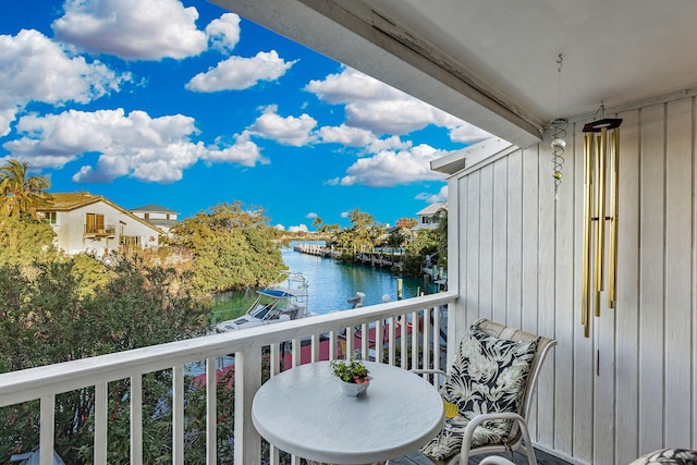 balcony featuring a water view