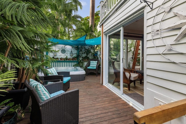 wooden deck featuring an outdoor living space