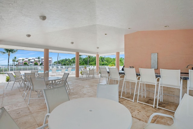 view of patio / terrace featuring a community pool