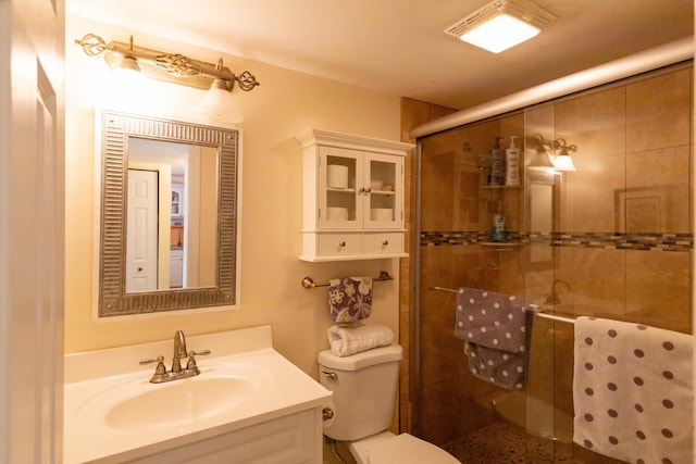 104350 Overseas Hwy Unit A204, Key Largo, FL 33037 - full bathroom featuring toilet, vanity, and a shower stall