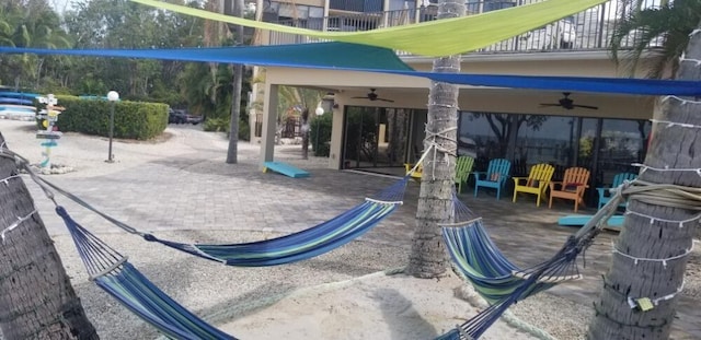 104350 Overseas Hwy Unit A204, Key Largo, FL 33037 - view of play area featuring a ceiling fan