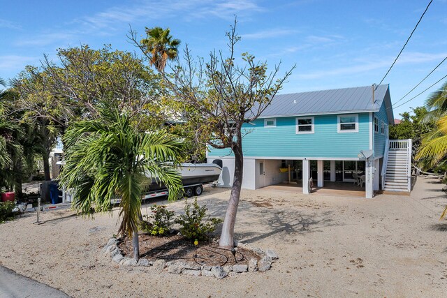 view of front facade with a carport