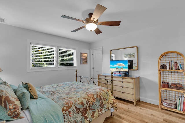 bedroom featuring ceiling fan and light wood-type flooring