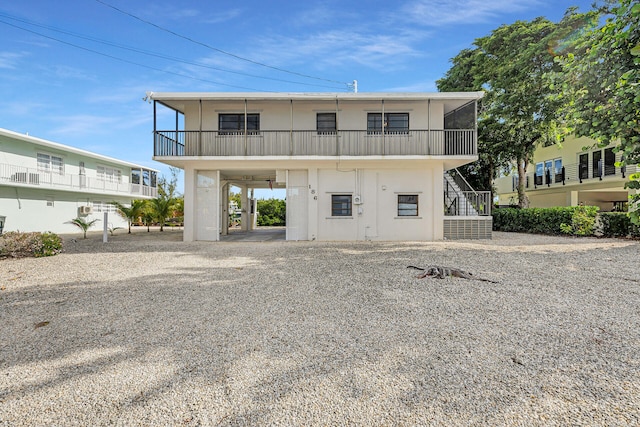 exterior space featuring a carport