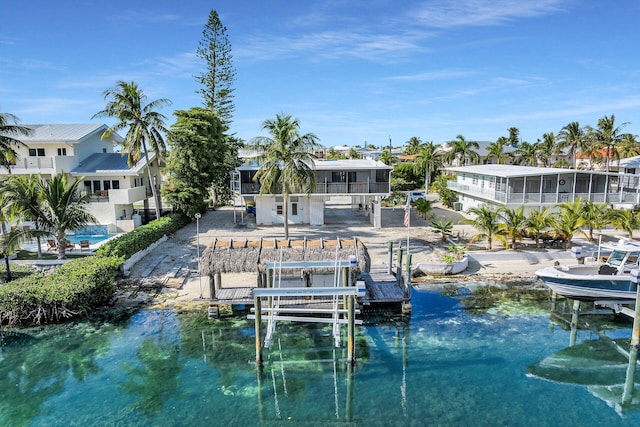 dock area featuring a water view