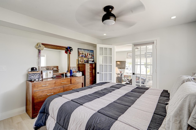 162 Azalea St, Tavernier, FL 33070 - bedroom featuring light wood-type flooring, recessed lighting, a ceiling fan, and french doors