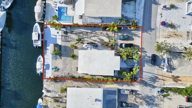 162 Azalea St, Tavernier, FL 33070 - aerial view of property and surrounding area with property boundaries highlighted and a nearby body of water